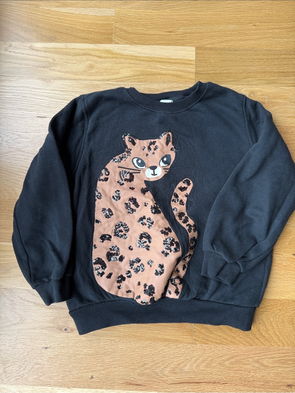 H&M Black Sweatshirt with Tan Leopard Cat Graphic